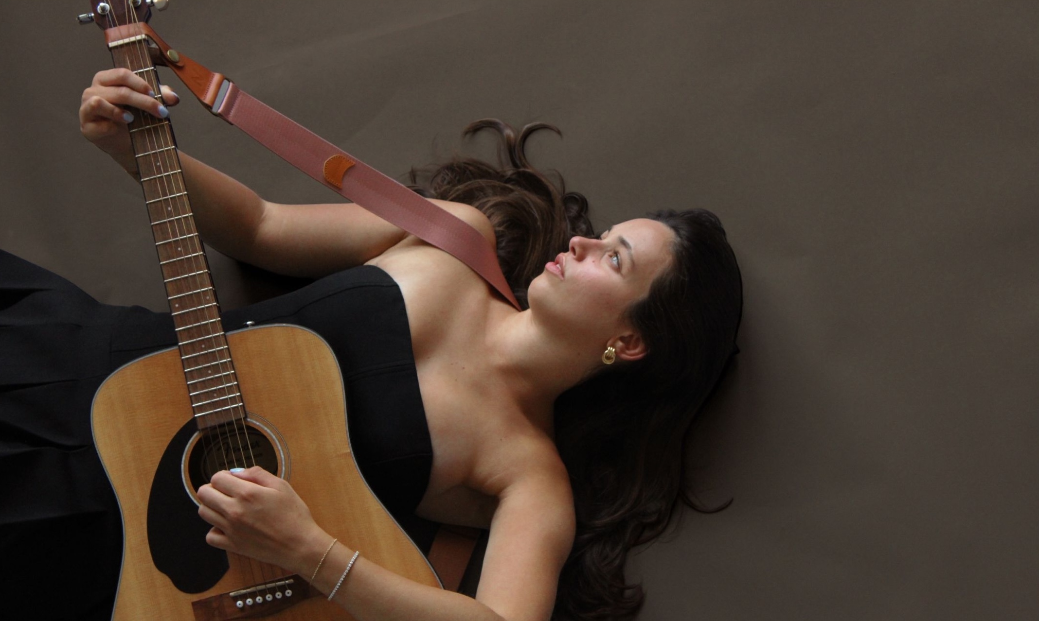 Lauren Fabio playing guitar